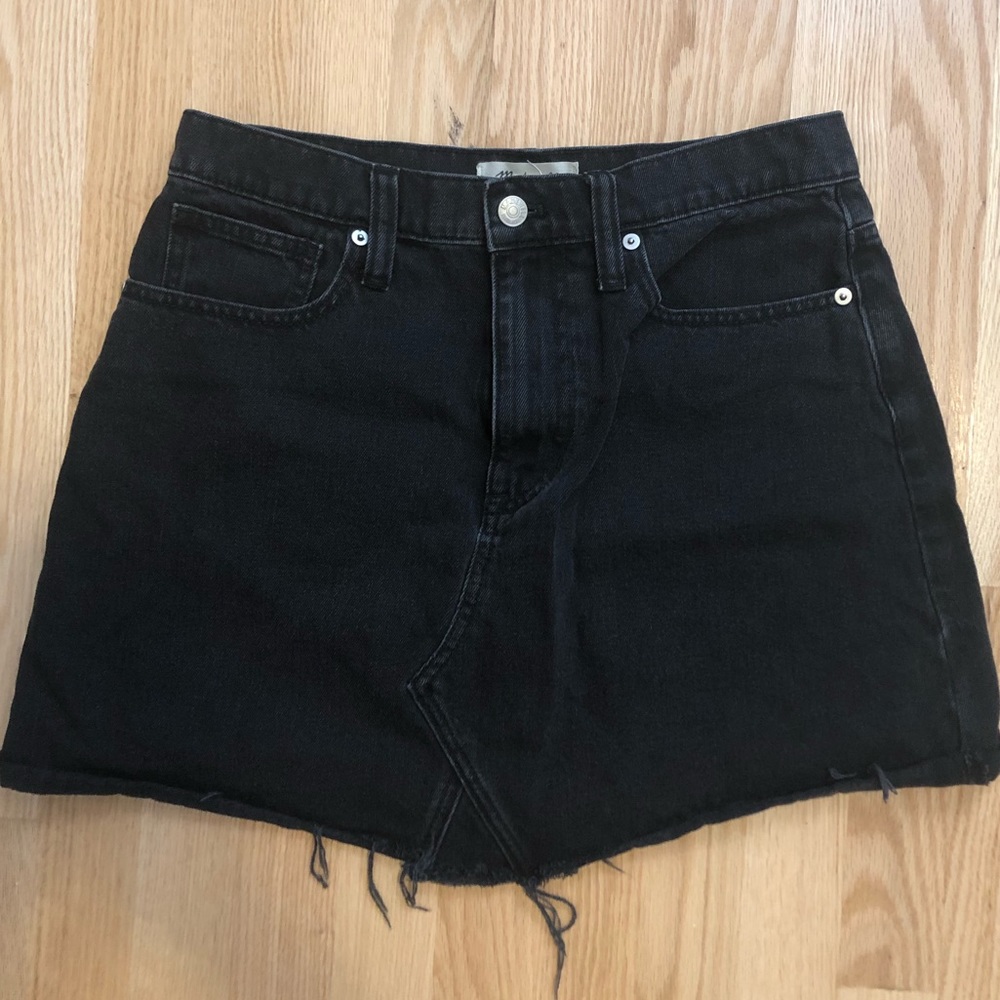 Made well distressed black denim skirt